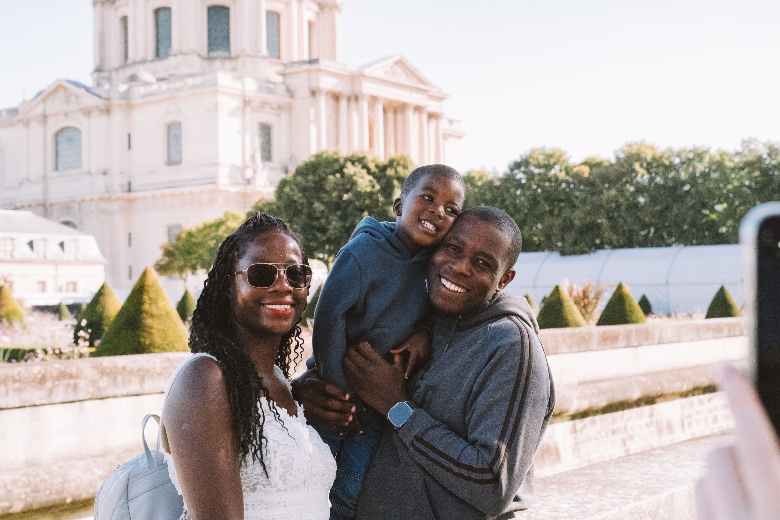 Guest family posing at Invalides - Paris Highlights Bike Tour 2